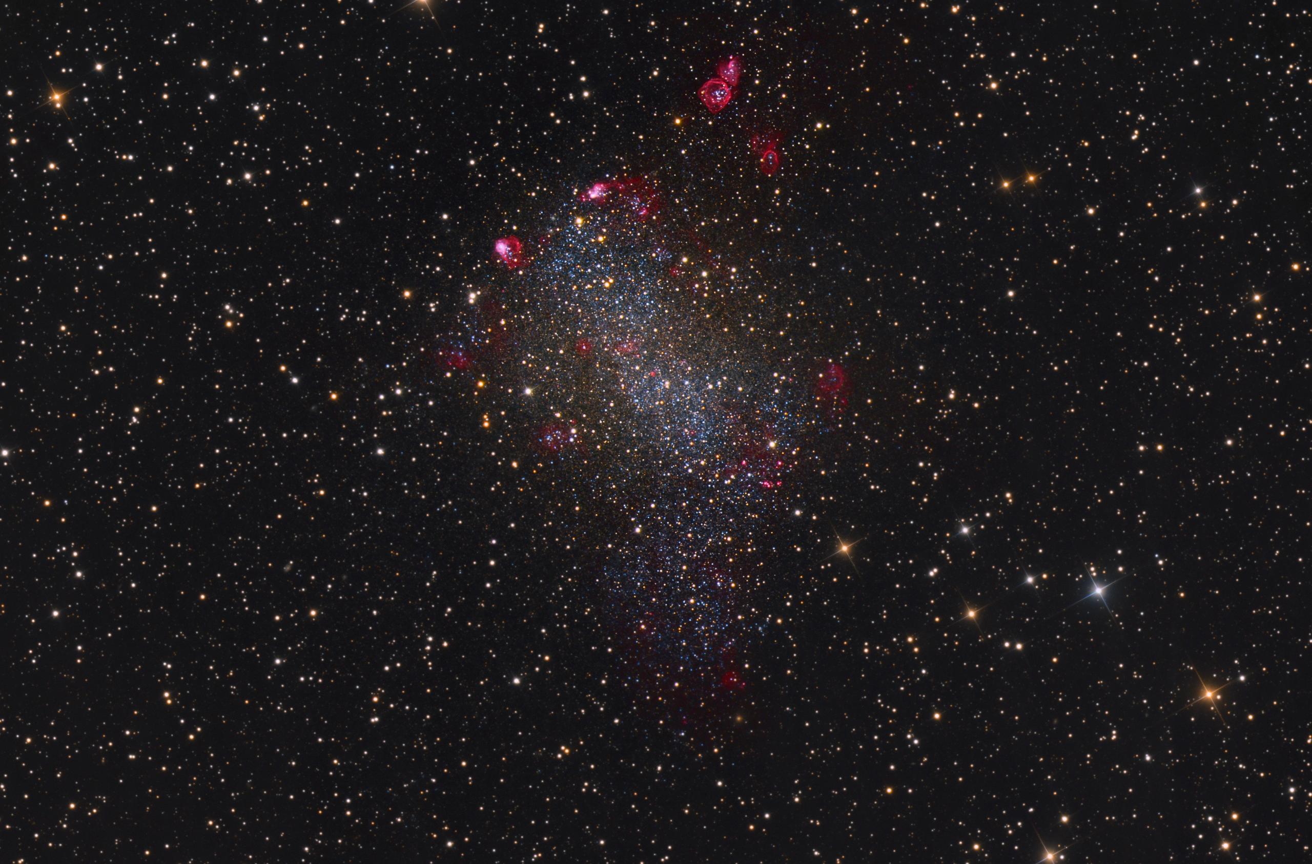 barnard-galaxy-ngc-6822-halrgb-display Barnard's Galaxy NGC 6822, a dwarf irregular of the Local Group speckled with pink emission nebulae