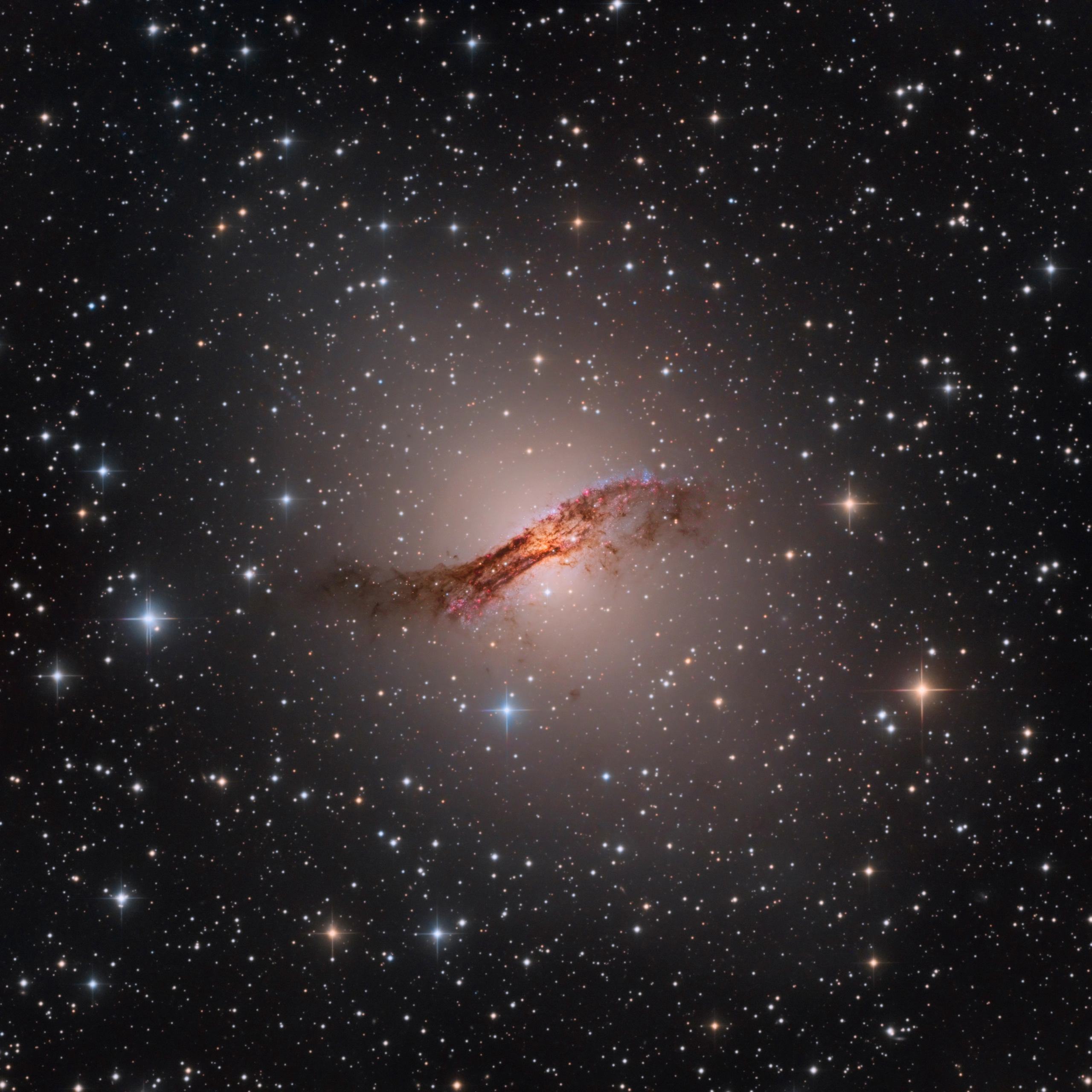 centaurus-a-ngc-5128-galaxy-lrgb-display Centaurus A (NGC 5128), an elliptical galaxy cut in half by the dark dust lane of an ancient merger