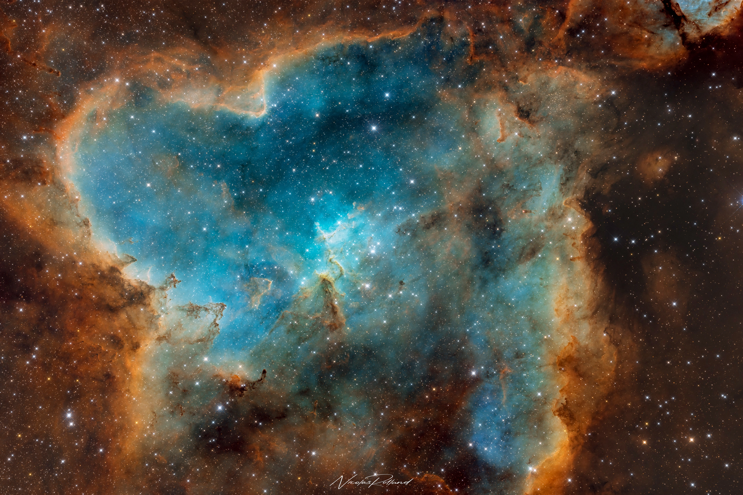 The carved centre of the Heart Nebula in Cassiopeia, its cavity lit by the Melotte 15 cluster in 25.5 hours