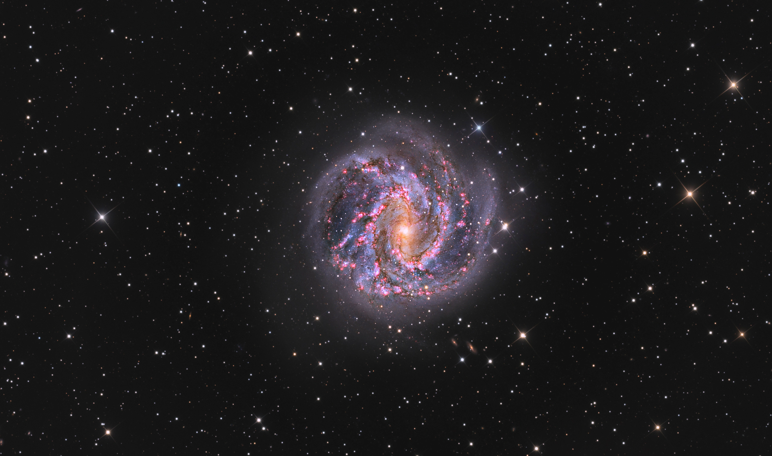 southern-pinwheel-galaxy-messier-83-lrgb-display The Southern Pinwheel Galaxy Messier 83, a barred spiral studded with pink star-forming regions